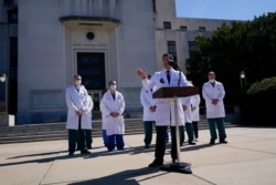 Dr. Sean Conley, physician to President Donald Trump, briefs reporters at Walter Reed National Military Medical Center in Bethesda, Maryland, Oct. 3, 2020.