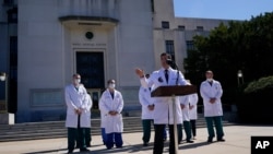 Dr. Sean Conley, physician to President Donald Trump, briefs reporters at Walter Reed National Military Medical Center in Bethesda, Maryland, Oct. 3, 2020. Trump was admitted to the hospital after contracting the coronavirus. 