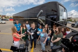 U.S. residents get set to depart a Canadian pharmacy after purchasing lower-cost insulin in London, Ontario, June 29, 2019.