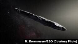 Ilustrasi artis asteroid 'Oumuamua, benda antar bintang pertama yang diketahui mengunjungi tata surya kita. 