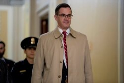 FILE - Former top national security adviser to President Donald Trump, Tim Morrison, arrives for a closed door meeting to testify as part of the House impeachment inquiry into President Donald Trump on Capitol Hill in Washington, Oct. 31, 2019.