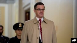 Former top national security adviser to President Donald Trump, Tim Morrison, arrives for a closed door meeting to testify as part of the House impeachment inquiry into President Donald Trump on Capitol Hill in Washington, Oct. 31, 2019. 