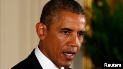 U.S. President Barack Obama speaks during a ceremony at the White House, Aug. 26, 2013. 