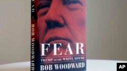A copy of Bob Woodward's "Fear" is photographed Wednesday, Sept. 5, 2018, in New York. It's not clear whether President Donald Trump has much to fear from "Fear" itself. 