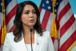 FILE - Rep. Tulsi Gabbard, D-Hawaii, speaks during a news conference in New York, Oct. 29, 2019.