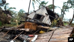 FILE — A house lays in ruins in Mananjary, Madagascar, on February 10, 2022 after it was damaged by Cyclone Batsirai. 
