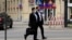 FILE - Two unidentified members of an Iranian delegation walk in Vienna on April 5, 2021, as they prepare for talks the next day aimed at reviving the 2015 Iran nuclear deal. (VOA Persian/Guita Aryan)
