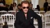 Johnny Hallyday, "rock'n'roll attitude" à la française