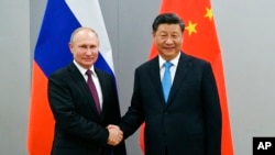 中國領導人習近平與俄羅斯總統普京在巴西出席金磚國家峰會期間舉行會晤。（2019年11月12日）