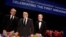 Former Washington Post reporters Bob Woodward (left to right) and Carl Bernstein stand with White House Correspondents' Association President Jeff Mason of Reuters at the head table before the association's dinner in Washington, April 29, 2017. 