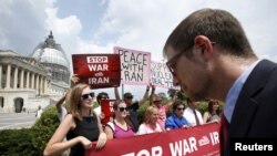Activists deliver more than 400,000 petition signatures to Capitol Hill in support of the Iran nuclear deal in Washington, July 29, 2015. 