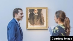 "Portrait of Edmond Belamy" is displayed for viewing. (Courtesy: Obvious)