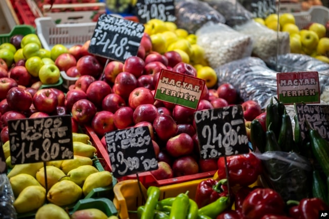 Domestic harvested fruits and vegetables are displayed in Budapest's Grand Market Hall on April 8, 2023. (AP Photo/Denes Erdos)