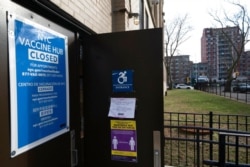 A vaccination center at the Abraham Lincoln High School is closed, in New York, Jan. 21, 2021, as the city waits for more vaccine supplies.