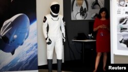 SpaceX shows its new spacesuit that will be worn by NASA astronauts during their first spaceflights in the Crew Dragon spacecraft during a visit to SpaceX headquarters in Hawthorne, California, U.S., Aug. 13, 2018. 