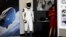 SpaceX shows its new spacesuit that will be worn by NASA astronauts during their first spaceflights in the Crew Dragon spacecraft during a visit to SpaceX headquarters in Hawthorne, California, U.S., Aug. 13, 2018. 