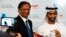 SpiceJet chairman and managing director Ajay Singh, left, and Sheikh Khalid bin Saud Al Qasimi, a son of Ras al-Khaimah ruler Sheikh Saud bin Saqr Al Qasimi, right, pose for photographs during a news conference in Ras al-Khaimah, UAE, Oct. 23, 2019. 