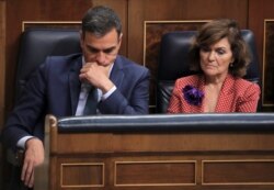 Spain's acting Prime Minister Pedro Sanchez and Deputy Prime Minister Carmen Calvo attend the final day of the investiture debate at the Parliament in Madrid, July 25, 2019.