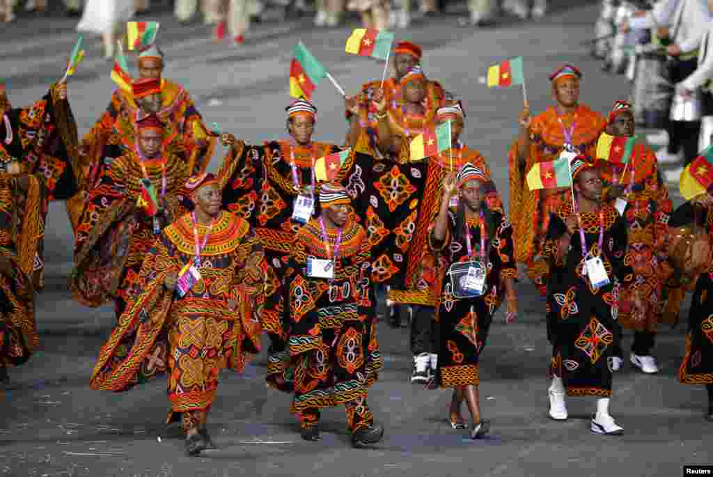 Cameroon's athletes march on the parade during the opening ceremony of the London 2012 Olympic Games, at the Olympic Stadium, July 27, 2012.