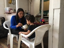 Leticia Gaitan with her son in Costa Rica