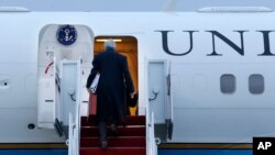 U.S. Secretary of State John Kerry boards his plane at Andrews Air Force Base, Md., en route to London in his inaugural official trip as Secretary on Sunday, Feb. 24, 2013.