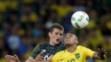 Germany's Sven Bender, left, and Brazil's Neymar go for a header during the final match of the men's Olympic football tournament won by Brazil in Rio de Janeiro, Aug. 20, 2016. 