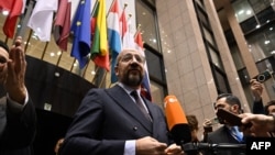 European Council President Charles Michel delivers remarks to journalists in the European Council atrium in Brussels on Dec. 14, 2023. EU leaders voted to open membership talks with Ukraine and Moldova.