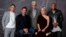 Bradley Cooper, seated left, cast member and director of the film "A Star is Born," poses with actors, from left, Anthony Ramos, Sam Elliott, Lady Gaga and Dave Chappelle at the Four Seasons Hotel during the Toronto International Film Festival in Toronto, Sept. 9, 2019.
