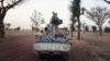 Militiaman from the Ansar Dine Islamic group ride on an armed vehicle between Gao and Kidal, northeastern Mali, June 12, 2012.