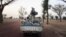 Militiaman from the Ansar Dine Islamic group ride on an armed vehicle between Gao and Kidal, northeastern Mali, June 12, 2012.