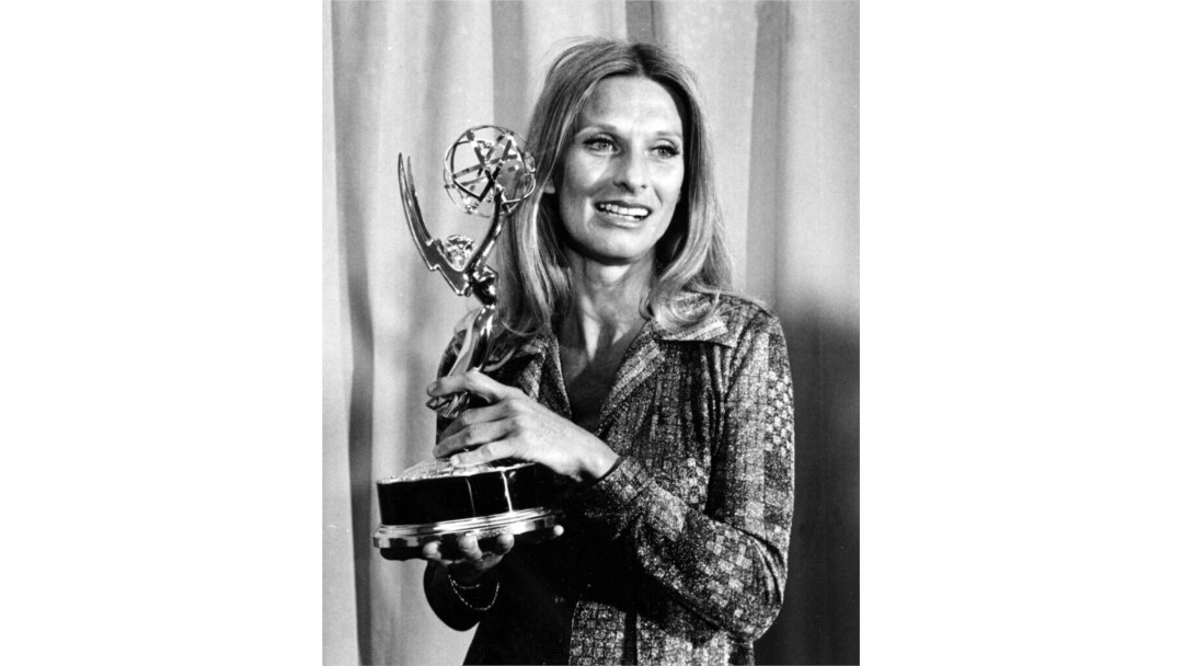 FILE - Cloris Leachman poses with her Emmy award for outstanding single performance by an actress in "A Brand New Life" at the Emmy Awards presentation in Los Angeles, May 21, 1975.