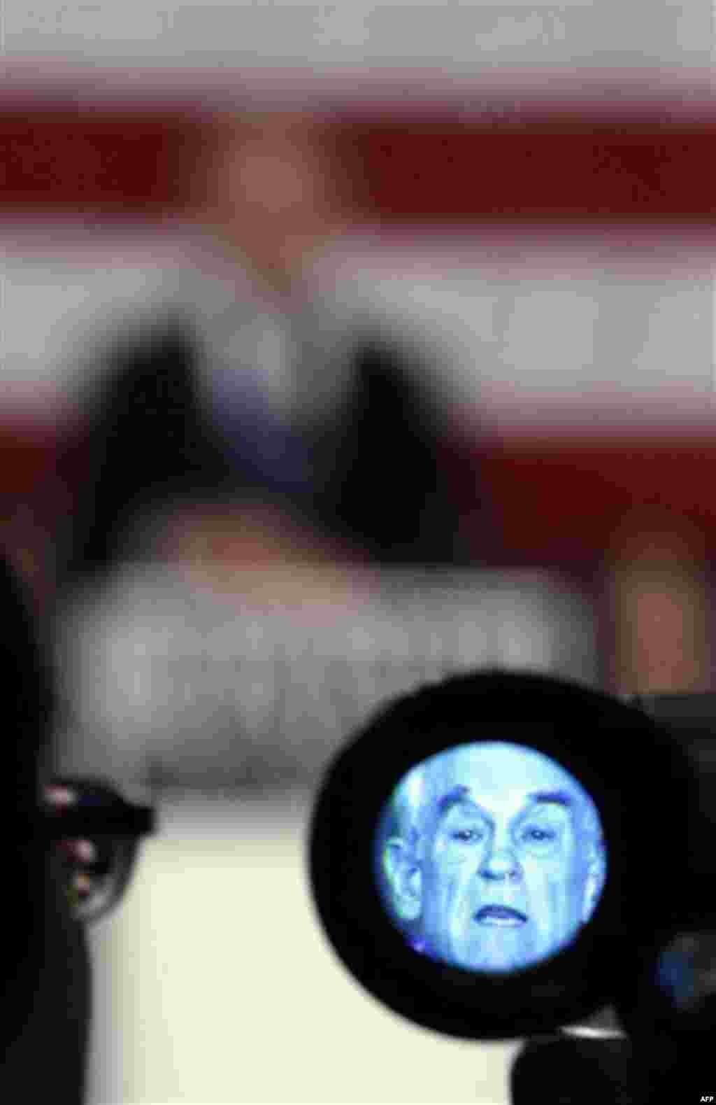 Republican presidential candidate, Rep. Ron Paul, R-Texas, is seen in a viewfinder as he speaks during a campaign stop at the Iowa State Fairgrounds in Des Moines, Iowa Wednesday, Dec. 28, 2011. (AP Photo/Charlie Riedel)