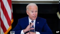 President Joe Biden speaks during a meeting with Asian American, Native Hawaiian, and Pacific Islander civil rights leaders, in the State Dining Room of the White House, Aug. 5, 2021, in Washington.