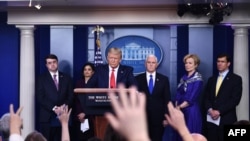 US President Donald Trump takes a question during the daily briefing on the novel coronavirus, COVID-19, at the White House on March 18, 2020, in Washington, DC. - Trump ordered the suspension of evictions and mortgage foreclosures for six weeks as…