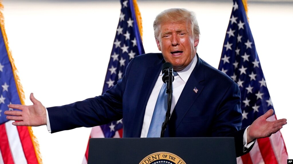 President Donald Trump speaks to a crowd of supporters at the Yuma International Airport Tuesday, Aug. 18, 2020, in Yuma, Ariz. (AP Photo/Matt York)