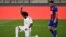 Marcelo, en blanc, célèbre son but lors du match entre le Real Madrid et Eibar, Espagne, le 14 juin 2020. (Photo: PIERRE-PHILIPPE MARCOU / AFP)