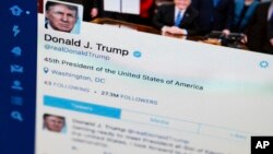 President Donald Trump's Twitter feed is photographed on a computer screen in Washington, April 3, 2017. The National Archives is telling the White House to keep each of President Donald Trump's tweets, even those he deletes or corrects.