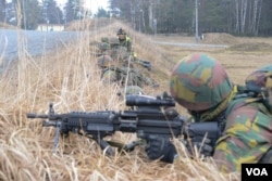 FILE - Belgian soldiers conduct training at the Grafenwoehr Training Area, as part of the European Union's Battle Group 2014-02, Feb. 21, 2014. (US Army photo)