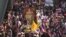 Thailand Protestors Accuse Former Prime Minister of Disloyalty to King