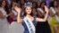 This Aug. 18, 2012 file photo shows newly-crowned Miss World Yu Wenxia, of China, after she won the Miss World 2012 beauty pageant at the Ordos Stadium Arena in inner Mongolia, China.