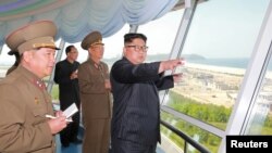 FILE - North Korean leader Kim Jong Un inspects the construction site of the Wonsan-Kalma coastal tourist area in this undated photo released by North Korea's Korean Central News Agency in Pyongyang.