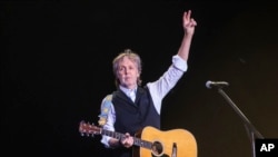 FILE - Paul McCartney performs at the Glastonbury Festival in Worthy Farm, Somerset, England, on June 25, 2022. (Photo by Joel C Ryan/Invision/AP)