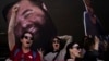 Demonstrators hold photos depicting the faces of Israeli hostages who are being held in the Gaza Strip, during a protest demanding their release from Hamas captivity, in Tel Aviv, Israel, March 6, 2025.