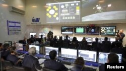 Team members of the Israel spacecraft, Beresheet, are seen in the control room in Yahud, Israel, April 11, 2019. 