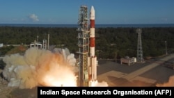 FILE - India's PSLV-C59 rocket is launched in this handout photo taken and released by Indian Space Research Organisation (ISRO) on Dec. 5, 2024. The PSLV-C60 rocket was launched on Dec. 30, 2024, carrying two small spacecraft to test docking in space.