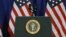 FILE - The U.S. presidential seal is seen on a podium at MacDill Air Force Base, in Tampa, Florida, Dec. 6, 2016.