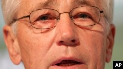 U.S. Secretary of Defense Chuck Hagel addresses the International Institute of Strategic Studies (IISS) conference in Manama, Bahrain, on Saturday, Dec. 7, 2013. 