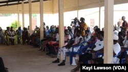 Les électeurs au rendez-vous à Tsévié, au Togo, le 26 juin 2019. (VOA/Kayi Lawson)