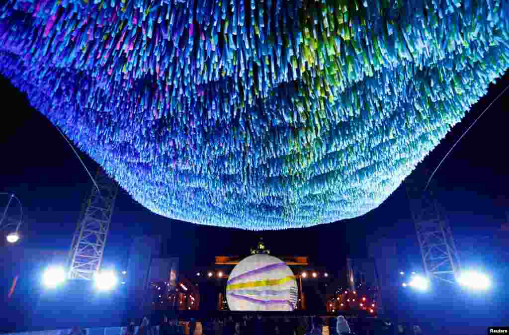 A general view shows the art installation &quot;Visions in Motion&quot; at Brandenburg Gate in Berlin, Germany.