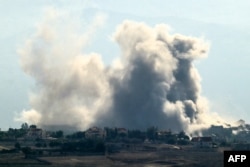 Smoke rises from the site of an Israeli airstrike that targeted the southern Lebanese village of Khiam on Oct. 12, 2024.